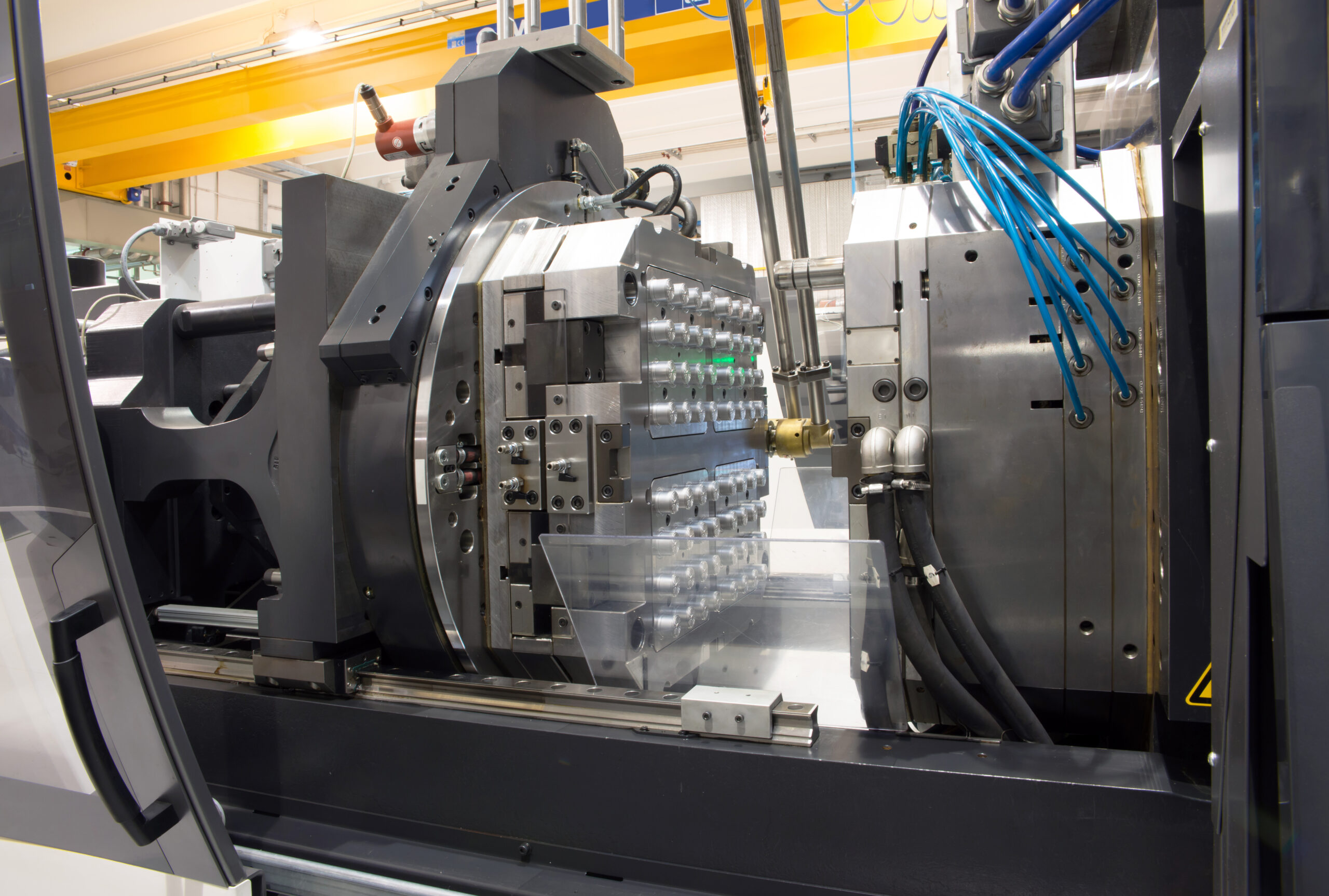 Injection,Molding,Machines,In,A,Large,Factory.,Department,Of,Italian